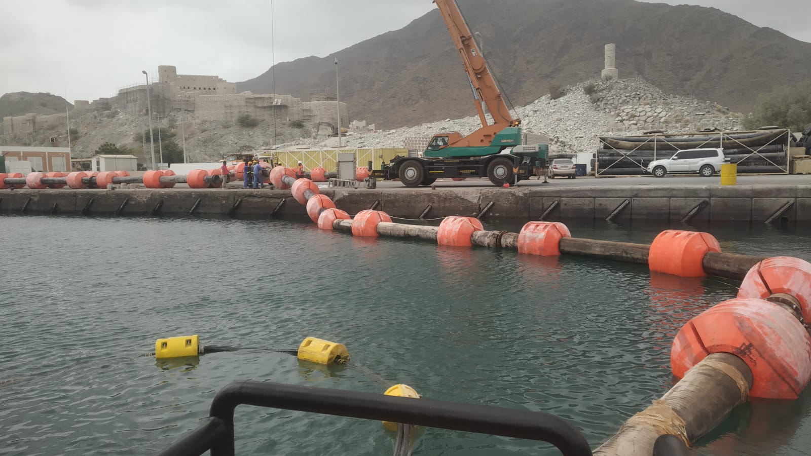 Floating discharge pipeline used during Khorfakkan dredging works